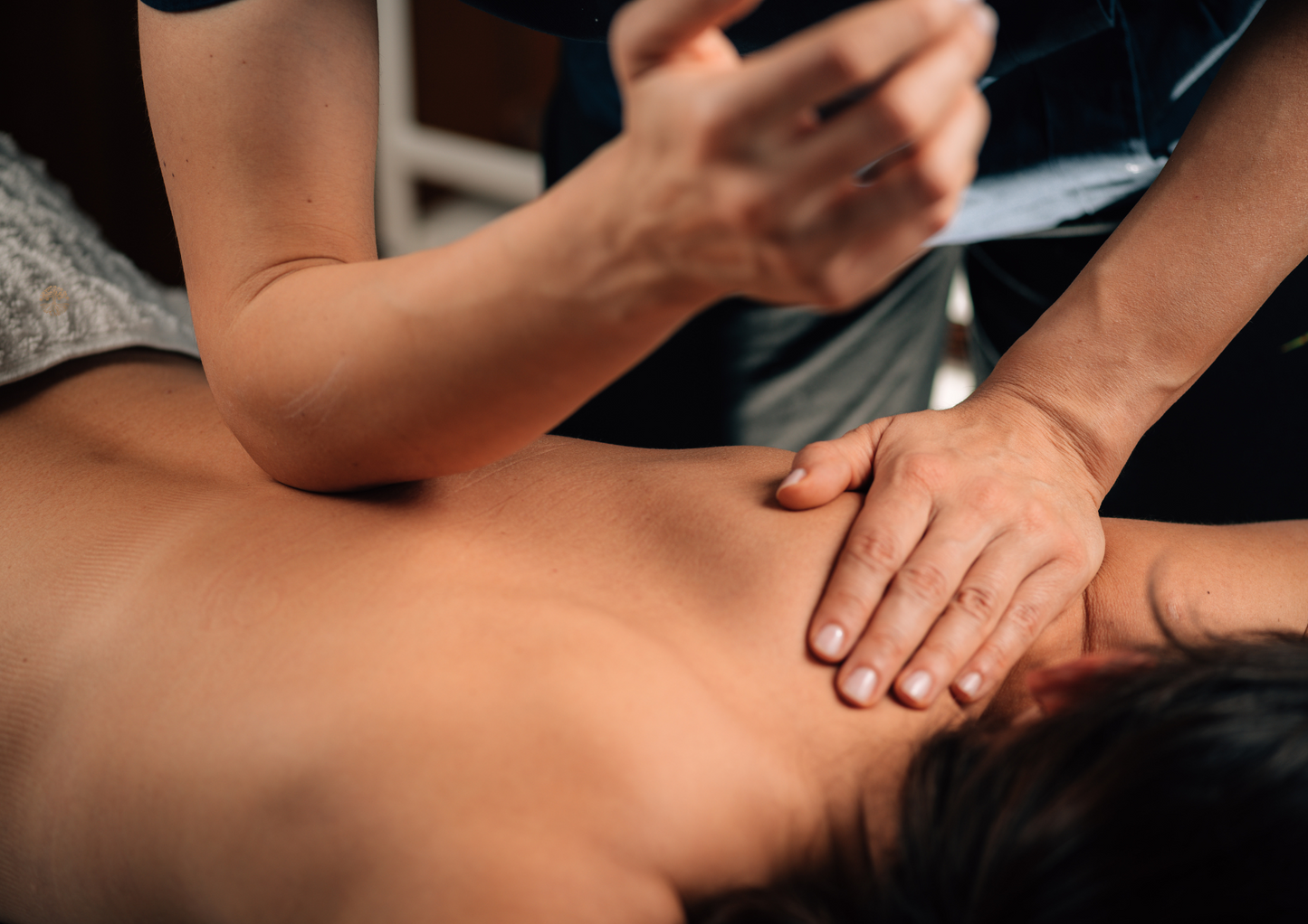 woman having deep tissue massage session 